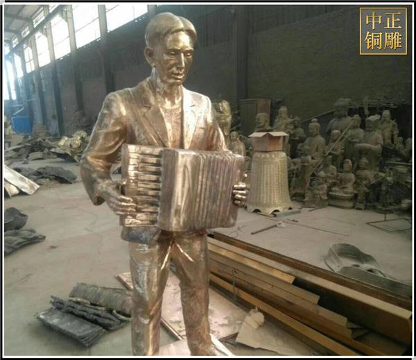 拉琴人物銅雕塑.jpg 拉琴人物銅雕塑.jpg